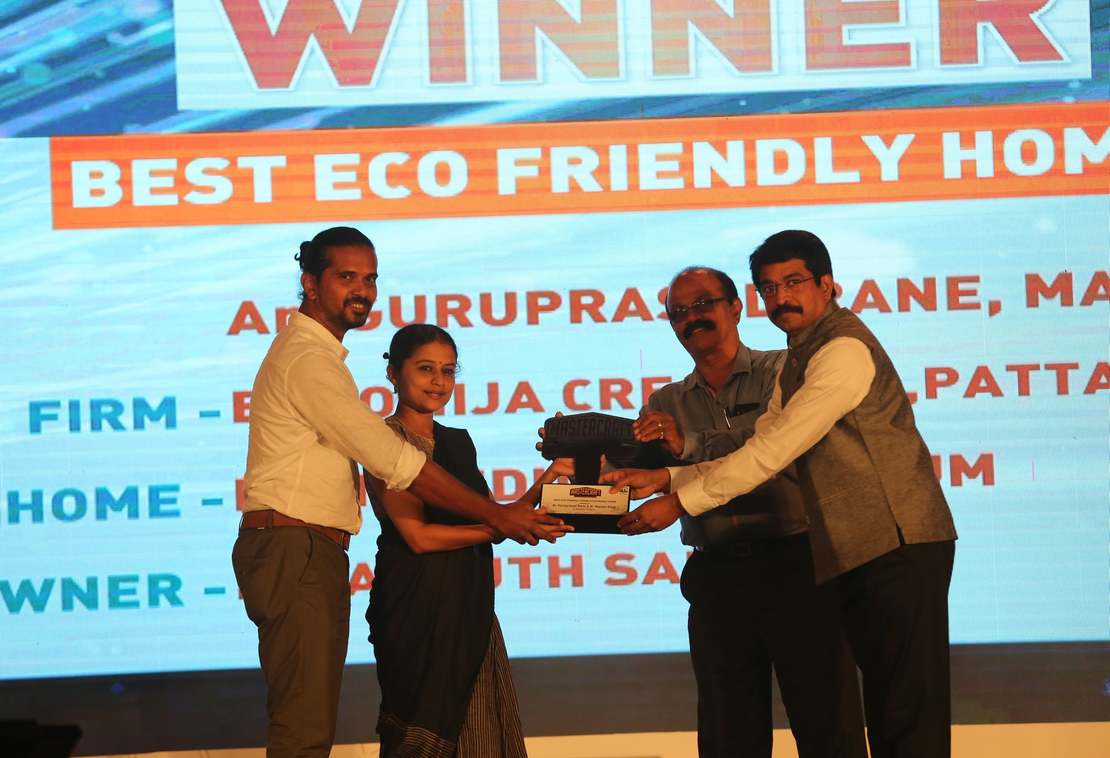 Ar. Guruprasad & Ar. Manasi receiving the award.